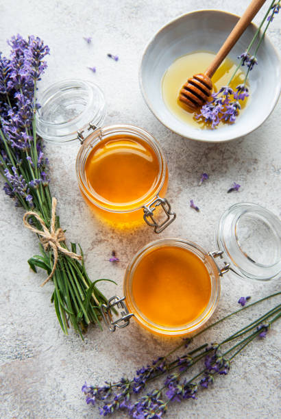 istock Jars with honey and fresh lavender flowers 1333165748
