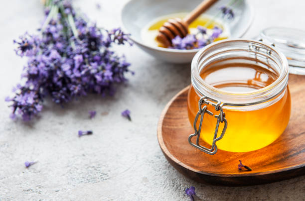 istock Jars with honey and fresh lavender flowers 1333165760