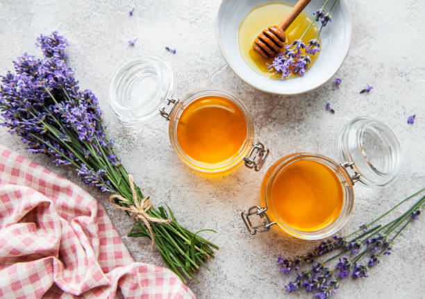 istock Jars with honey and fresh lavender flowers 1333165761
