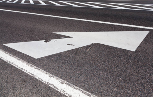 istock paved road with white road markings 1333167374