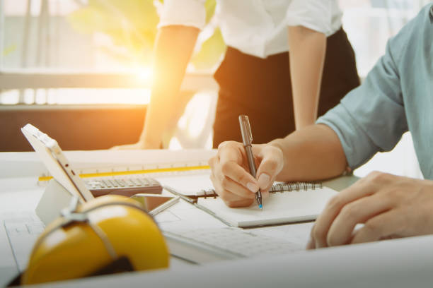 istock Engineer meeting in modern office with Architecture Interior Designer. Discussion to architectural project and Construction. Progress of Figures denoting of Accounting and Financial with partner 1333167619