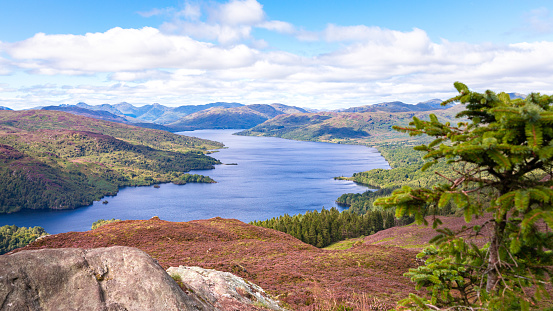 View over the Ben A'an mountain over the lakes Loch Katrine and Loch Achray in Scotland taken from The Ben A'an in Loch Lomond and The Trossachs National Park