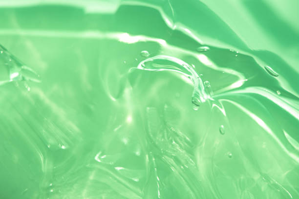 istock Green water Aloe Vera gel smudged texture 1333167971