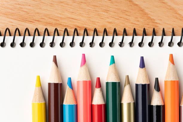 istock Colored pencils and sketchbooks 1333170229