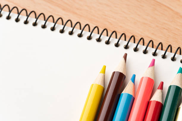istock Colored pencils and sketchbooks 1333170313