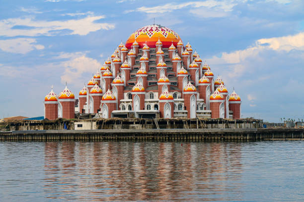 The 99-Dome Mosque at Losari Beach, Makassar The 99-Dome Mosque at Losari Beach, Makassar, Indonesia makassar stock pictures, royalty-free photos & images