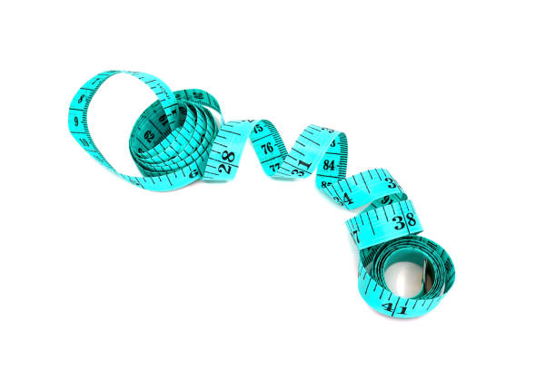 istock tape measure isolated on white background. 1333175161