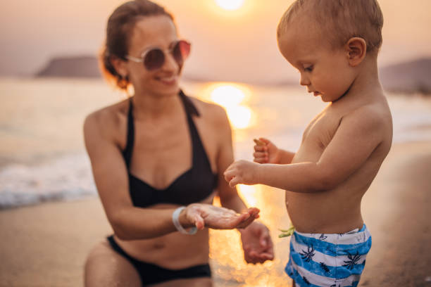 istock Mother and son having fun on vacation 1333175686