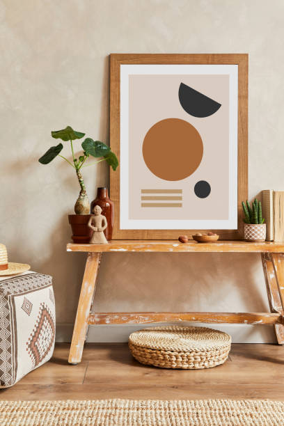 istock Creative composition of stylish living room interior with mock up poster frame, cacti and personal boho accessories. Plant love and nature concept. Template. 1333175687