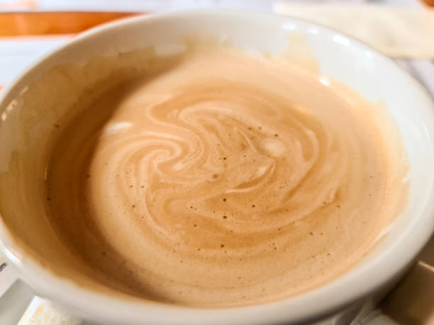 istock Close up view at a coffee in a white cup. 1333177596