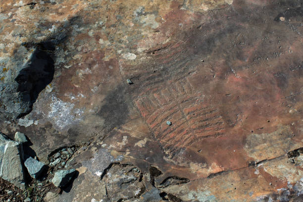 istock Petroglyphs (ancient rock paintings) in the Altai Mountains, Russia. 1333180162