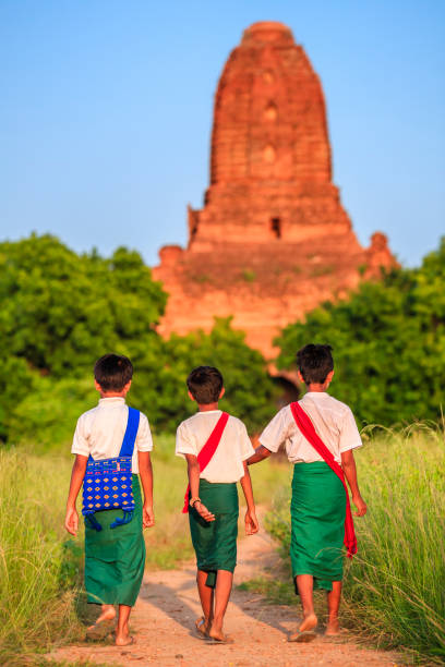 istock Young Burmese schoolboys walking in Bagan, Myanmar 1333182964