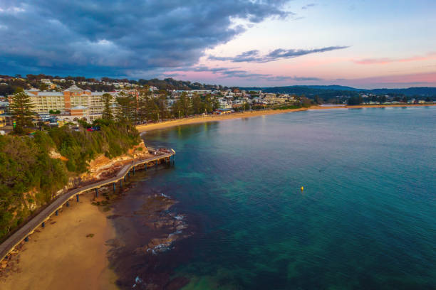 istock Aerial sunrise seascape with storm clouds rolling in 1333184128