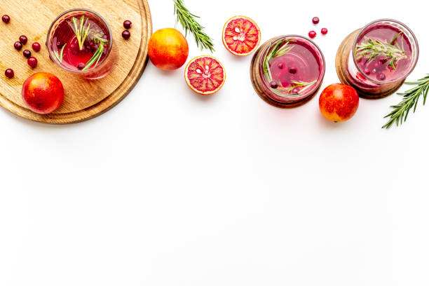 istock Sangria drink with blood orange grapefruit and rosemary. Top view 1333184266
