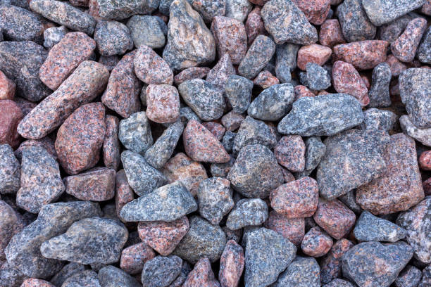 istock Natural crushed stone granite gravel close up 1333184494