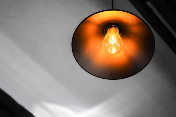 istock Tungsten lamp mounted in a round lampshade 1333185655