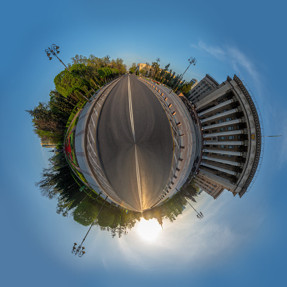 Spherical panorama of the central part of Almaty city in the early spring morning. The main building on the square was completed in 1957. It housed the Supreme Soviet of the Kazakh Soviet Socialist Republic. In 1991, a declaration of independence of the Republic of Kazakhstan was adopted in his countries. After the government moved to the new capital, the building was transferred to the Kazakh-British Technical University.