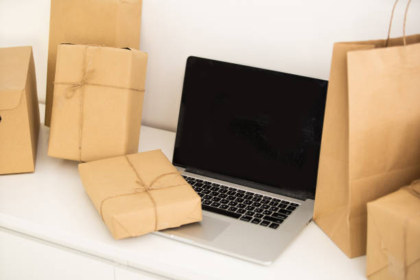 istock Cardboard boxes on your keyboard laptop, shopping. 1333187215
