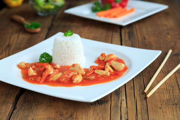 istock chicken sweet and sour with rice 1333188518