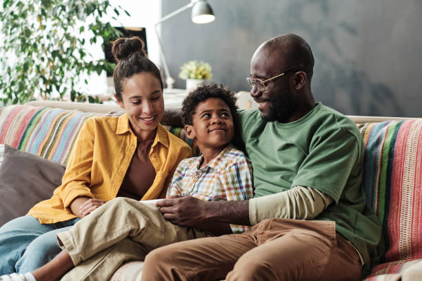 istock Family sitting at home 1333190485
