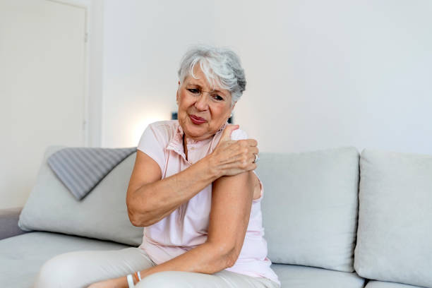 istock Woman with shoulder pain. 1333198616