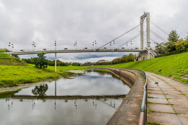 istock Pedestrian bridge over Nemunas river in Kaunas, Lithuani 1333200471