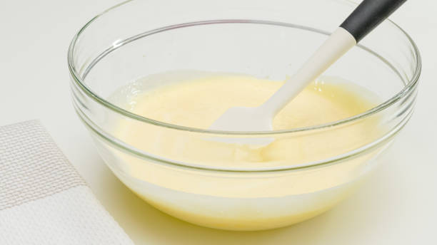 istock Cake batter close up in a glass bowl. Step by step baking process, recipe 1333200605