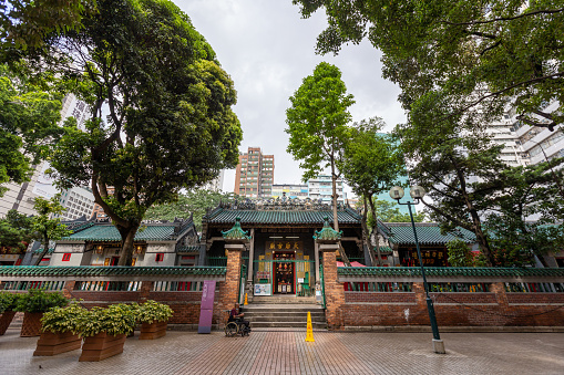 Hong Kong - August 9, 2021 : Tin Hau Temple Complex in Yau Ma Tei, Kowloon, Hong Kong. It comprises a five adjacent buildings: Yau Ma Tei Tin Hau Temple, Yau Ma Tei Shing Wong Temple, Yau Ma Tei Fuk Tak Tsz, Yau Ma Tei Shea Tan and the School.