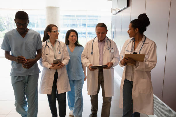 istock Medical staff walking at hallway 1333202439