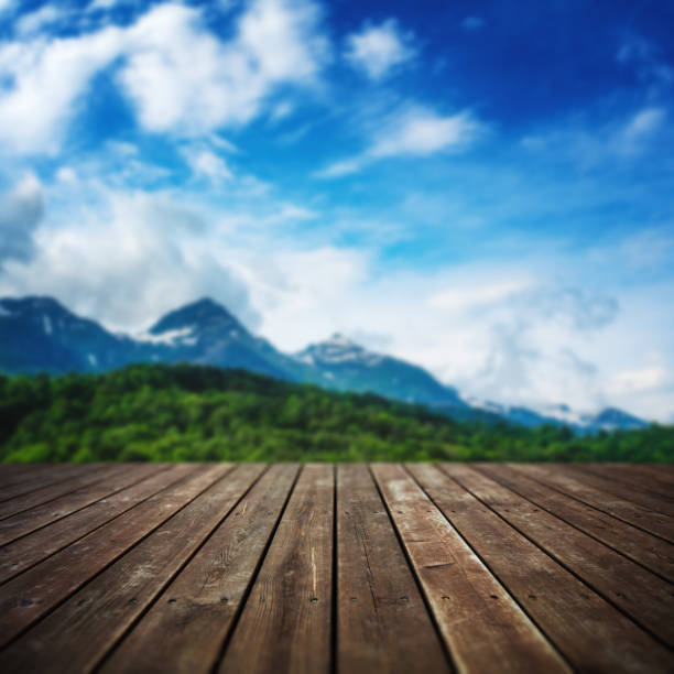 istock Wooden floor and defocused mountain landscape on background 1333204143
