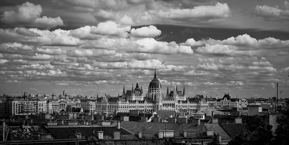 Hamburg, Germany - March 06, 2023: Black and white panorama view of downtown Hamburg with Speicherstadt and St. Catherine's Church, horizontal format