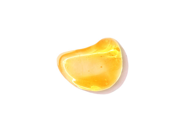 istock Drop, gel smear, golden color, transparent texture 1333205515