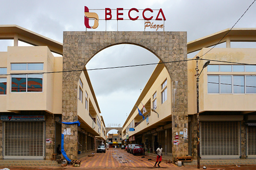 Banjul, The Gambia: Becca Plaza shopping mall - entrance arch on Liberation Avenue, retail venue and office building.