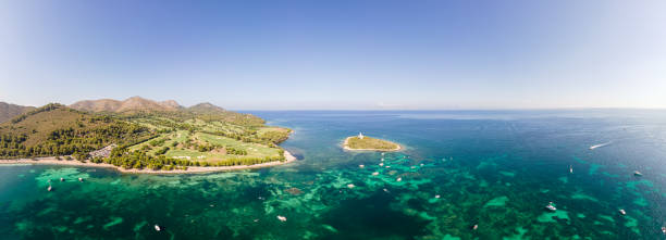 istock Aucanada Lighthouse and beach in Majorca, Balearic Islands - Spain 1333207375
