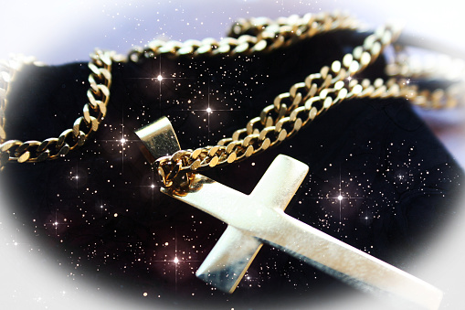 Hermoso oro jesucristo cruz con estrellas de alta calidad photo