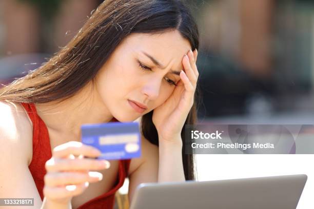 Worried Woman Having Problems Buying Online Stock Photo - Download Image Now - Identity Theft, Asian and Indian Ethnicities, Bank - Financial Building