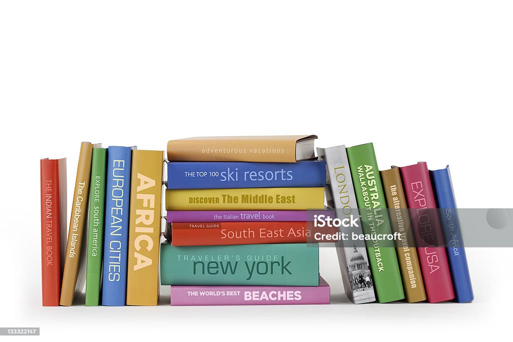 Travel books A variety of books with a Worldwide travel theme. All titles are mockups. Guidebook Stock Photo