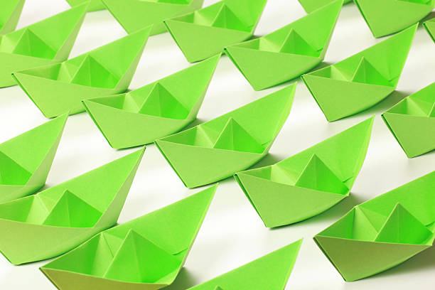 istock Green paper boats 133322167