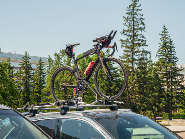 istock Car is transporting black bicycle on the roof. 1333222612