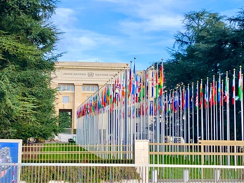 United nations building with nation flags infront in Geneve, Switzerland.