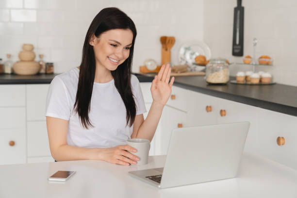 istock Cheerful smiling caucasian woman having video call conversation conference remotely, watching webinar online, e-learning, communicating with relatives at home. Female freelancer tutor on lecture 1333223831