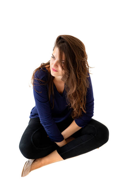 istock Young women with crossed legs 1333227685
