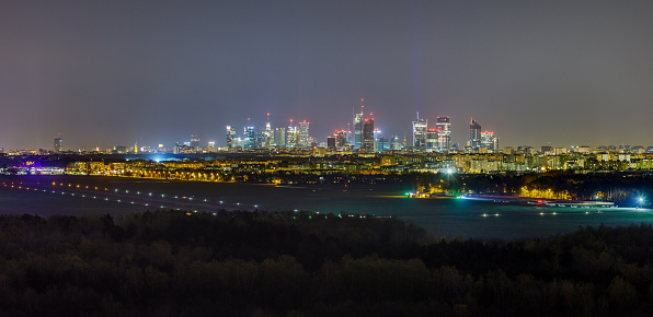 Warsaw skyscrapers by night, capital of Poland panoramic image