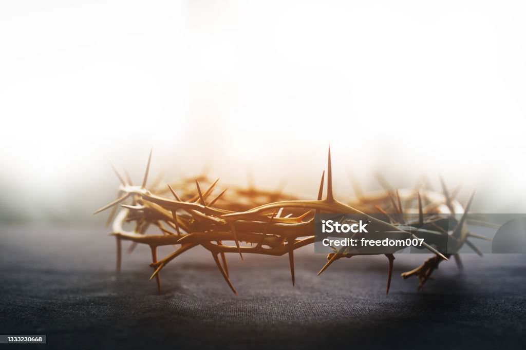 the crown of thorns of Jesus on  black background against  window light with copy space the crown of thorns of Jesus on  black background against  window light with copy space, can be used for Christian background, Easter concept Easter Stock Photo