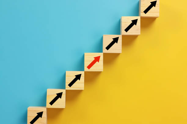 istock wooden block cube stacking as step stair. Business concept growth success process 1333234404