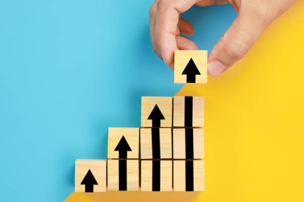 istock wooden block cube stacking as step stair. Business concept growth success process 1333234416