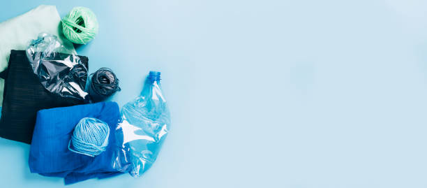 istock Polyester fiber synthetic fabrics eco-friendly textile recycled recyclable plastic bottles. Reuse recycling used bottles 1333234947