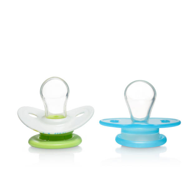 istock Pair of blue and green baby pacifiers isolated 1333236281