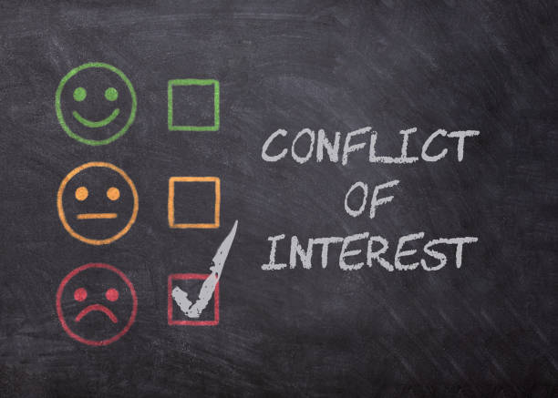 Conflict of Interest text written on blackboard with chalk. Concept for mediation, resolving conflict, dispute. Conflict of Interest text written on blackboard with chalk. Concept for mediation, resolving conflict, dispute. curiosity stock pictures, royalty-free photos & images