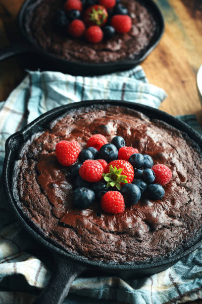 istock Cast Iron Chocolate Brownies with Berries 1333243848